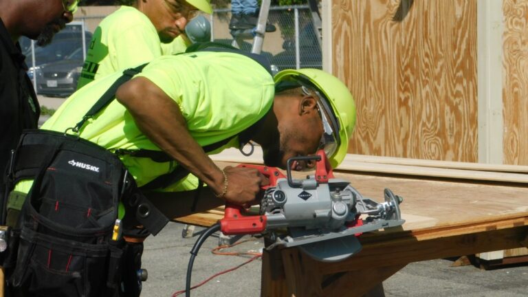 Man cutting wood