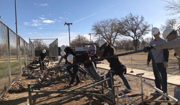 26731297_1735103933188158_6041601349547495137_n Students rebuilding playground